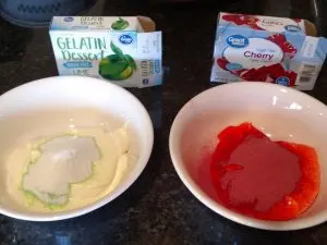 2 bowls and green Jell-O added to 1 and red to the other.