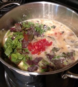 Healthy Pork Curry Vegetable Soup in soup pot on stove before cooking