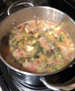 Healthy Pork Curry Vegetable Soup in soup pot on stove