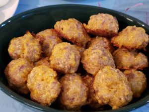 Low Carb Gluten Free Sausage Balls in green serving dish